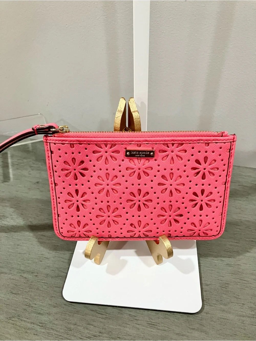 Kate Spade laser-cut floral wristlet clutch in pink